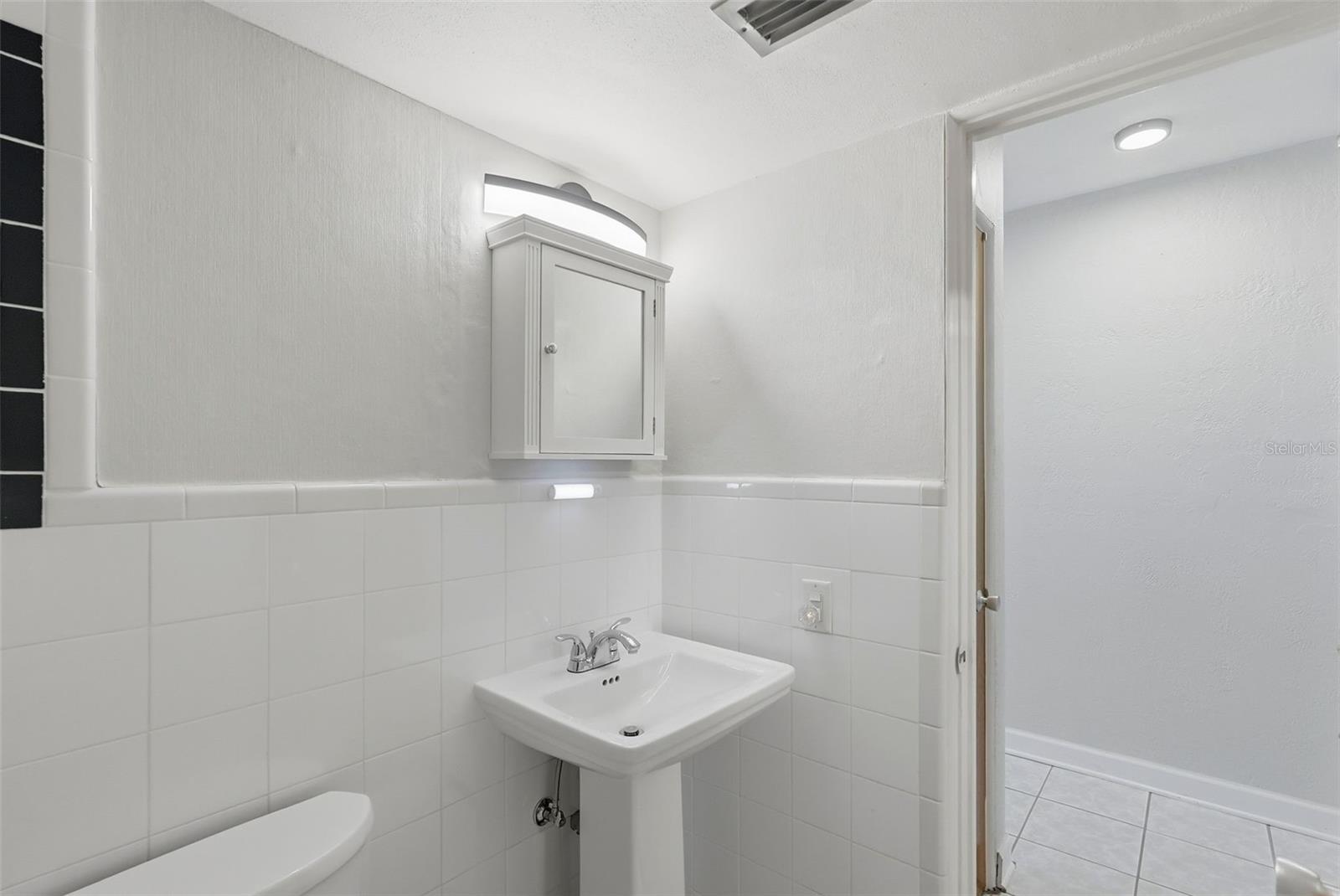 New pedestal sink in bathroom