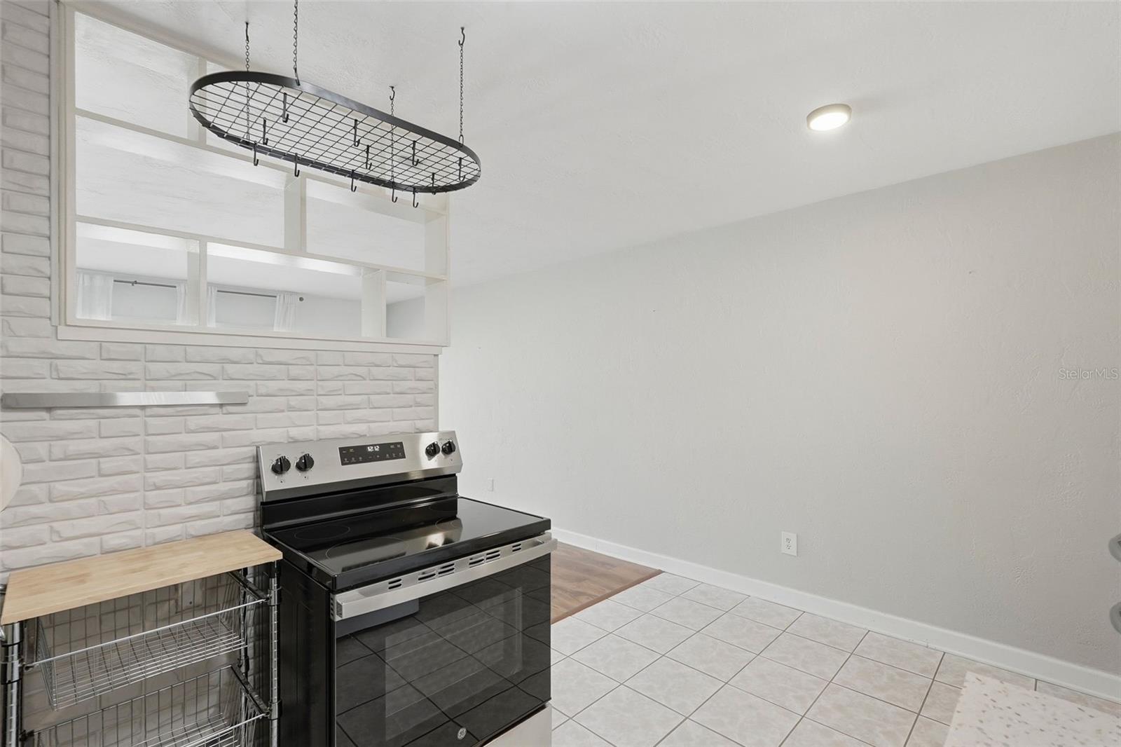 Great built in shelving allows the natural light to pour through the unit