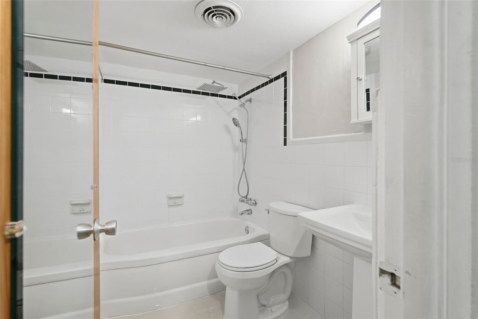 Photos don't do the bathroom justice - so bright and clean