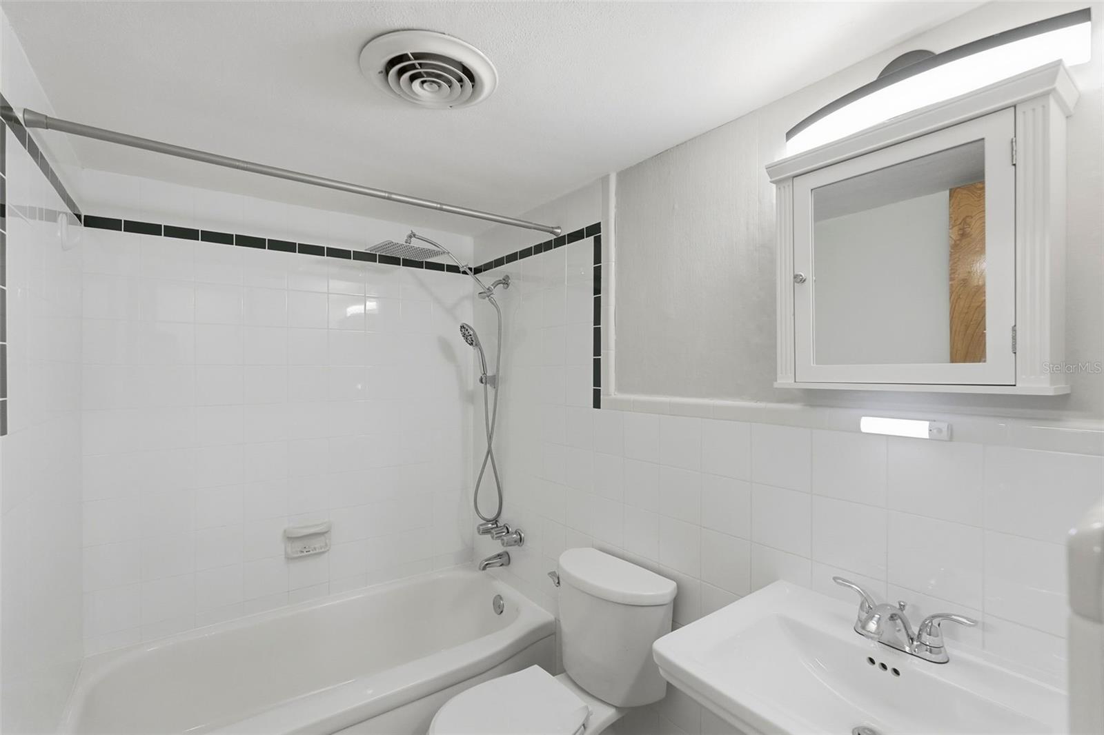 Wider view of bathroom