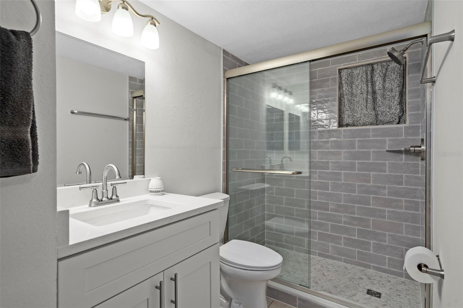 Bathroom with two access doors