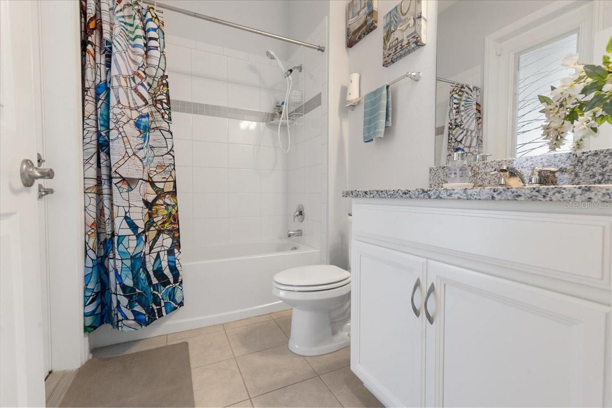 bathroom #3 with 2nd entrance to patio