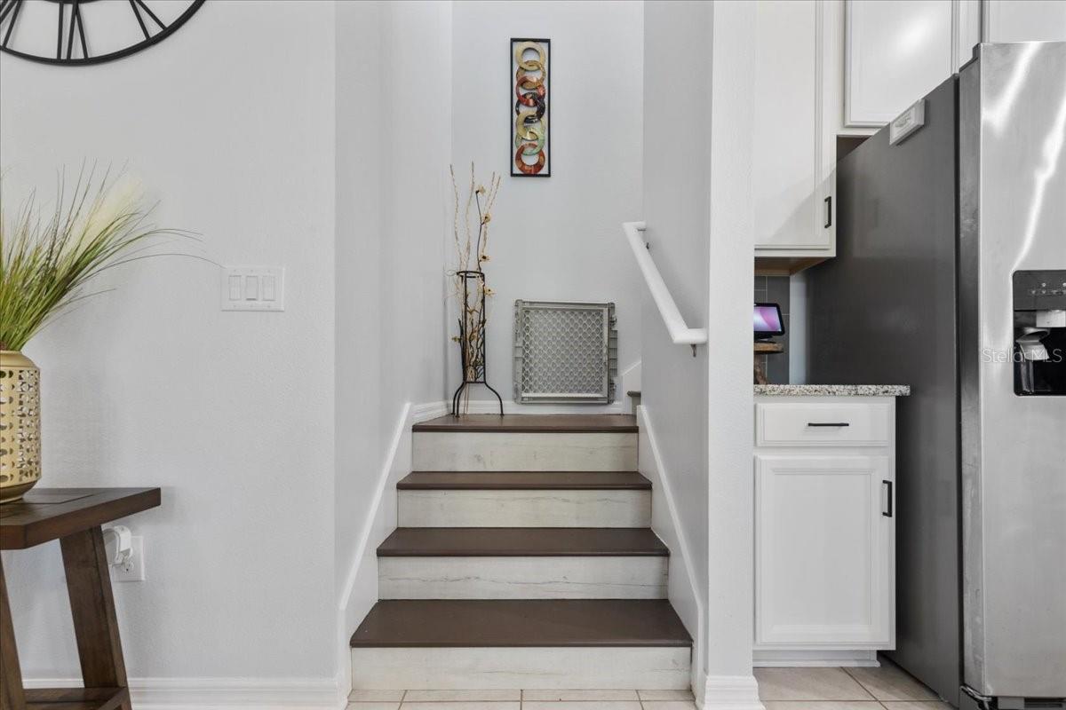 stairs to loft, 4th bedroom, and bathroom