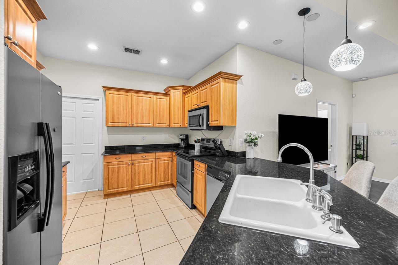 Stay close to family and guests in this spacious and open kitchen