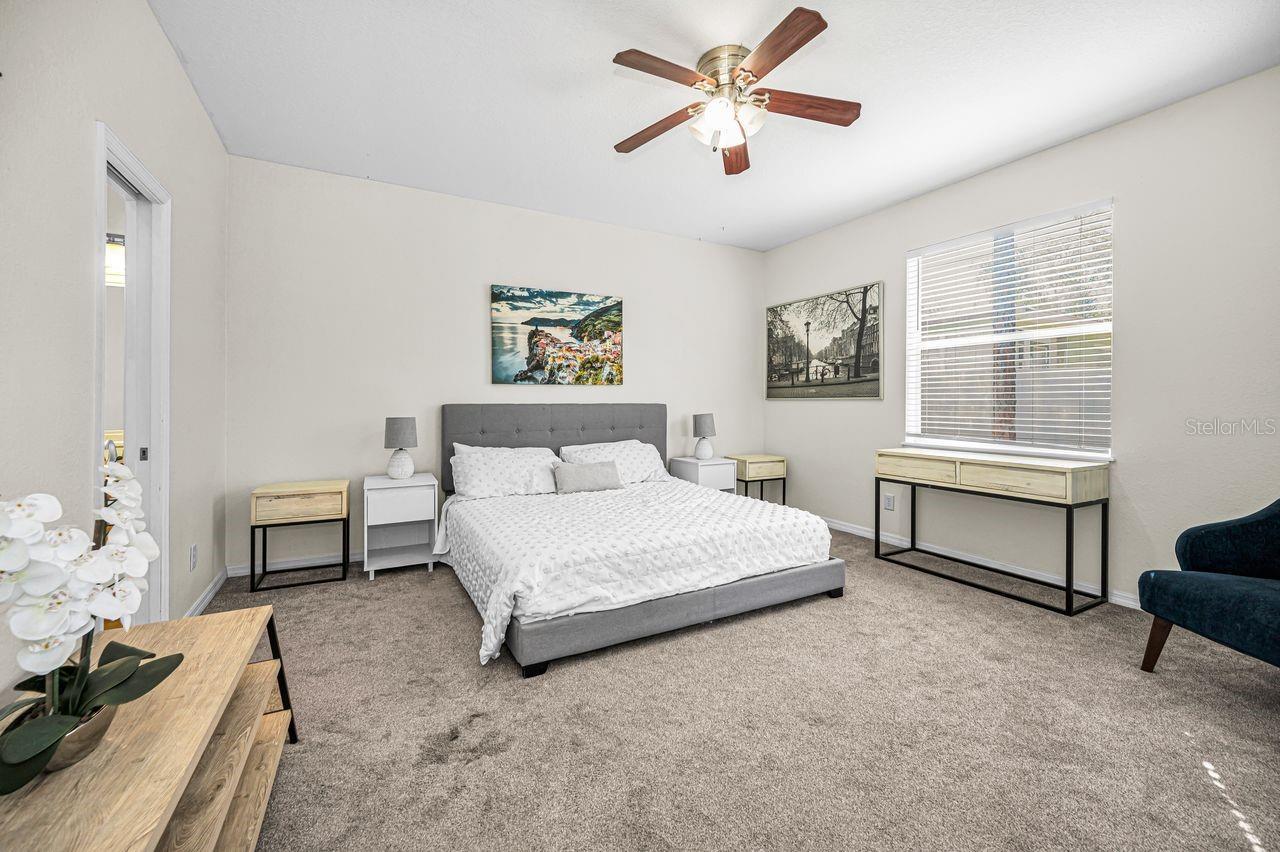 Quite a spacious primary suite with plenty of natural light.