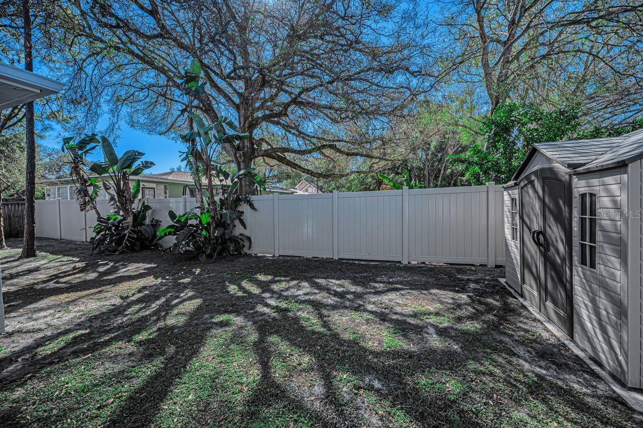 Spacious storage shed is in excellent condition as well and matches the home asthetics.