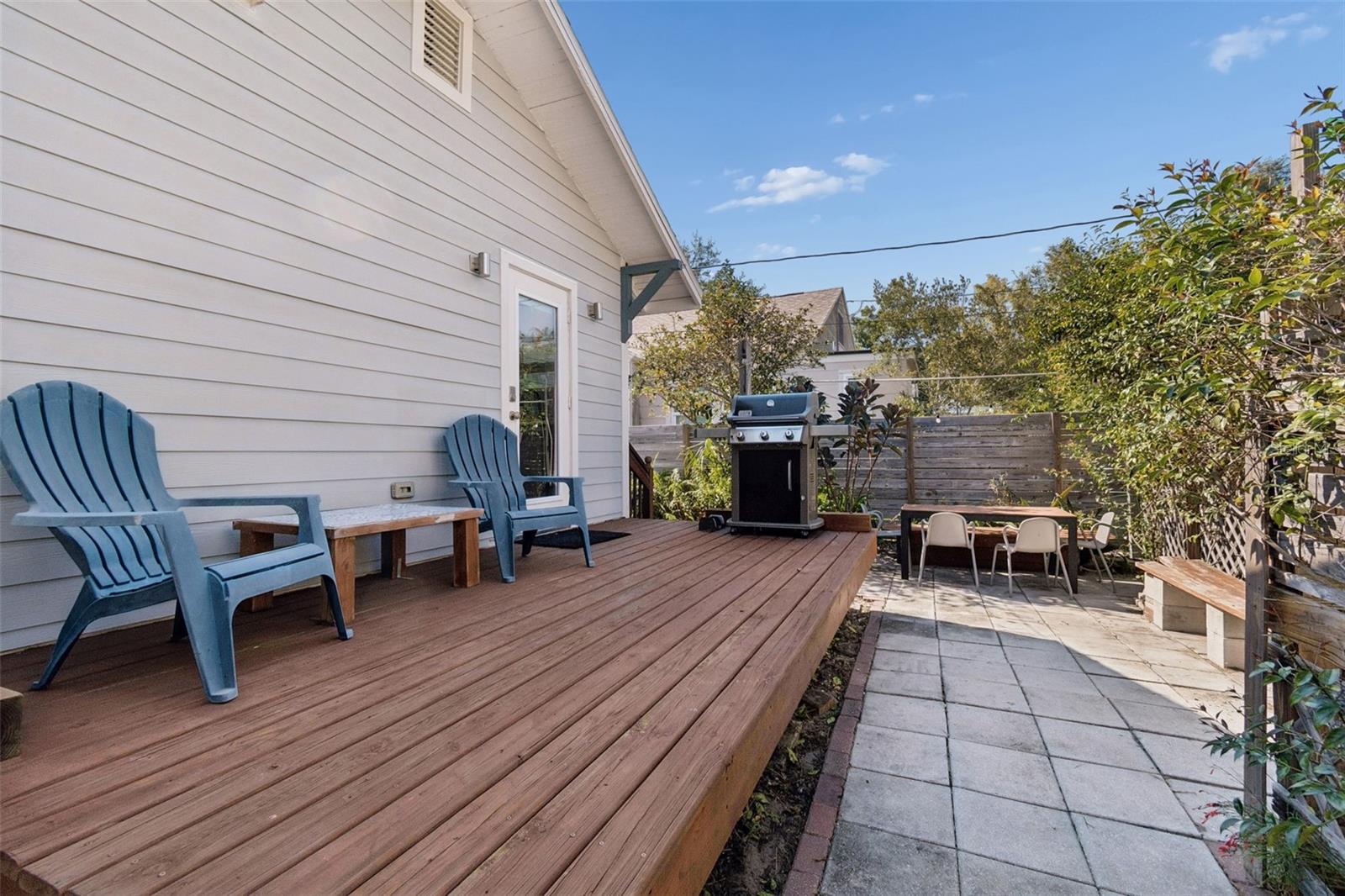 Back deck with eating area in the far right of photo