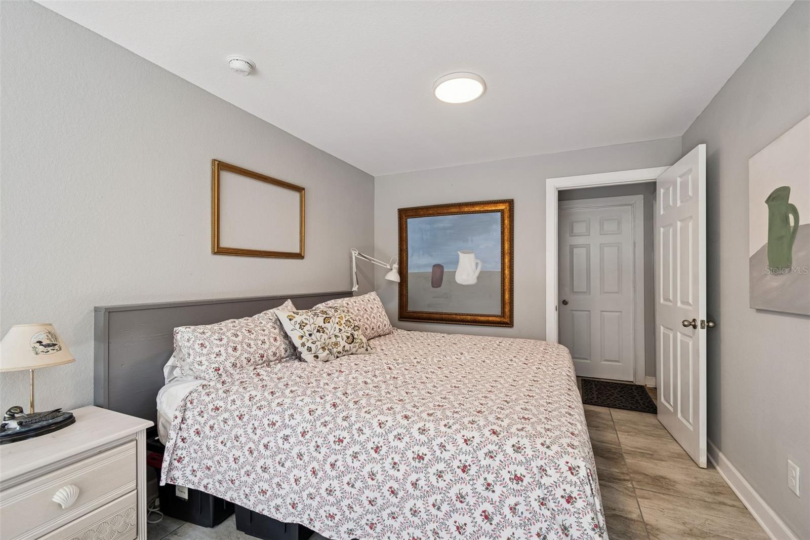 Studio area used for sleeping. Door on right leads to storage and half bath