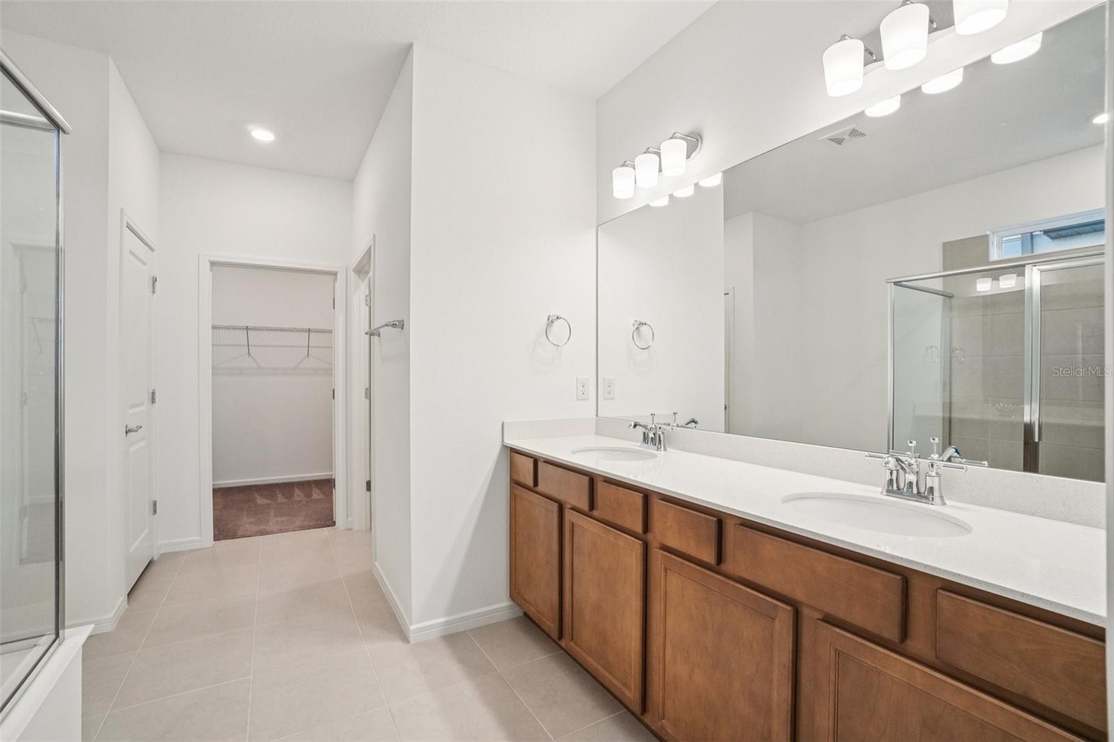 LONG VANITY IN PRIMARY BATH OFFER DUAL SINKS