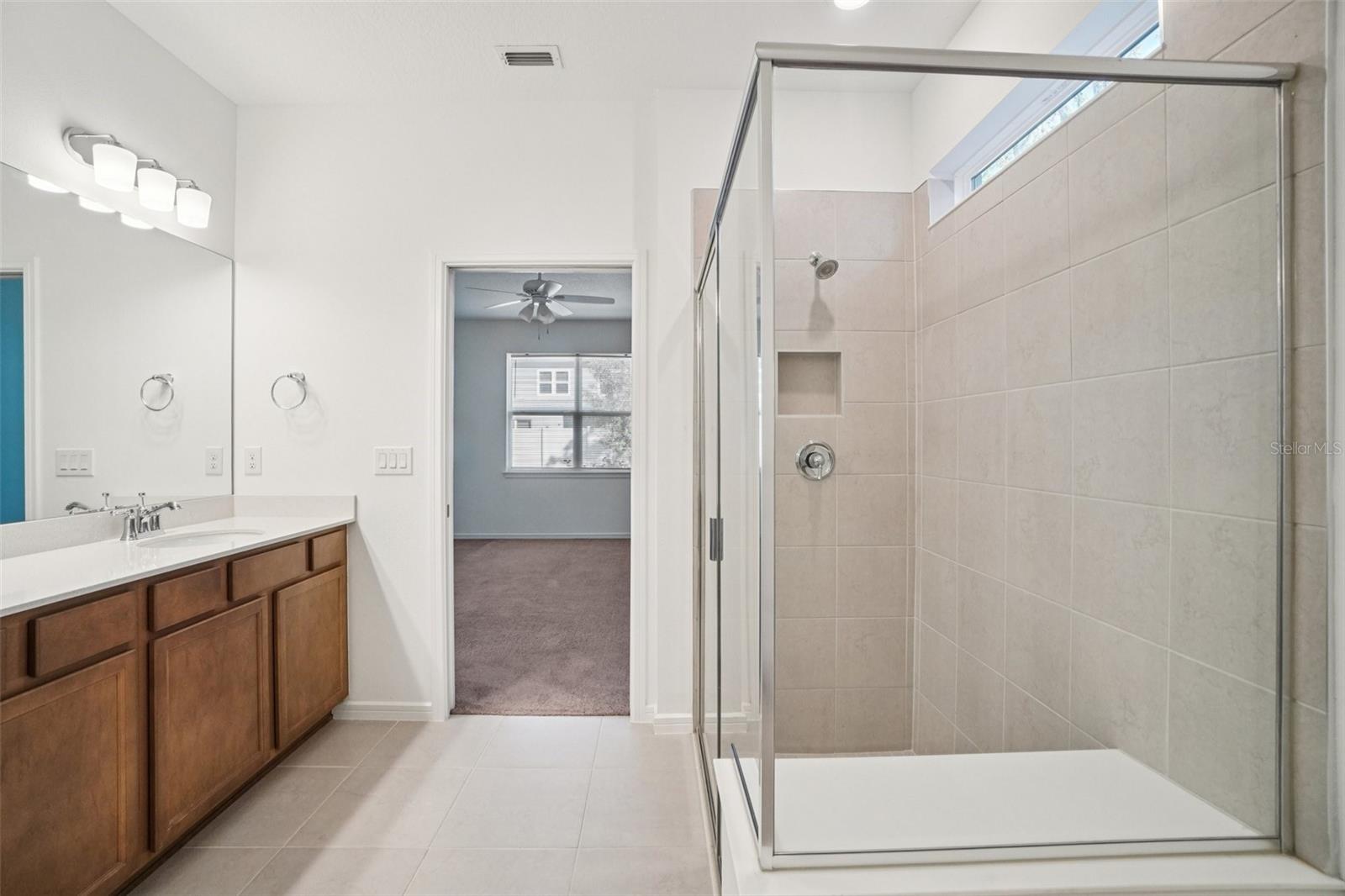 PRIMARY BATH HAS LARGE WALK-IN SHOWER