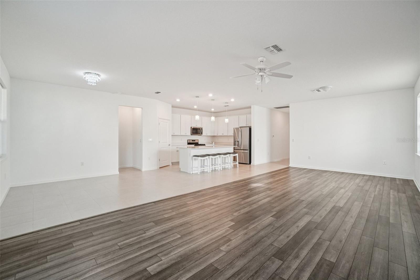 KITCHEN OVERLOOKS LIVING ROOM/DINING ROOM COMBO