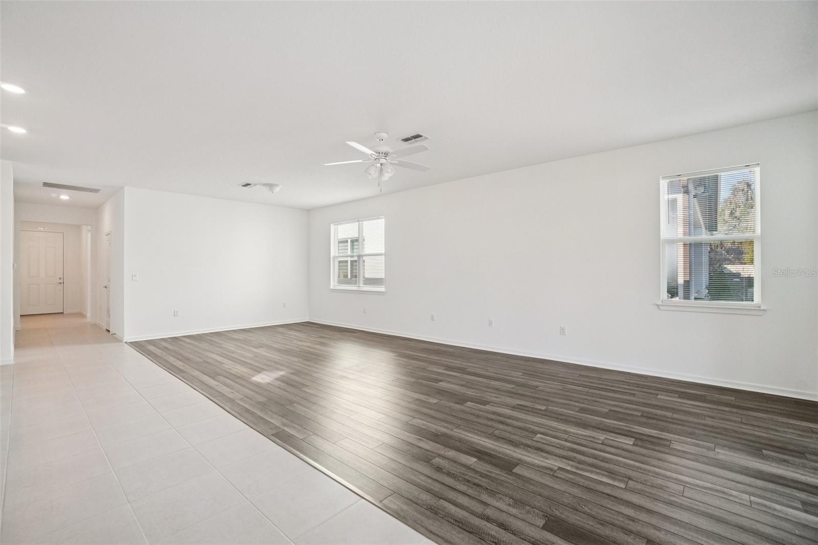 KITCHEN OVERLOOKS LIVING ROOM/DINING ROOM COMBO