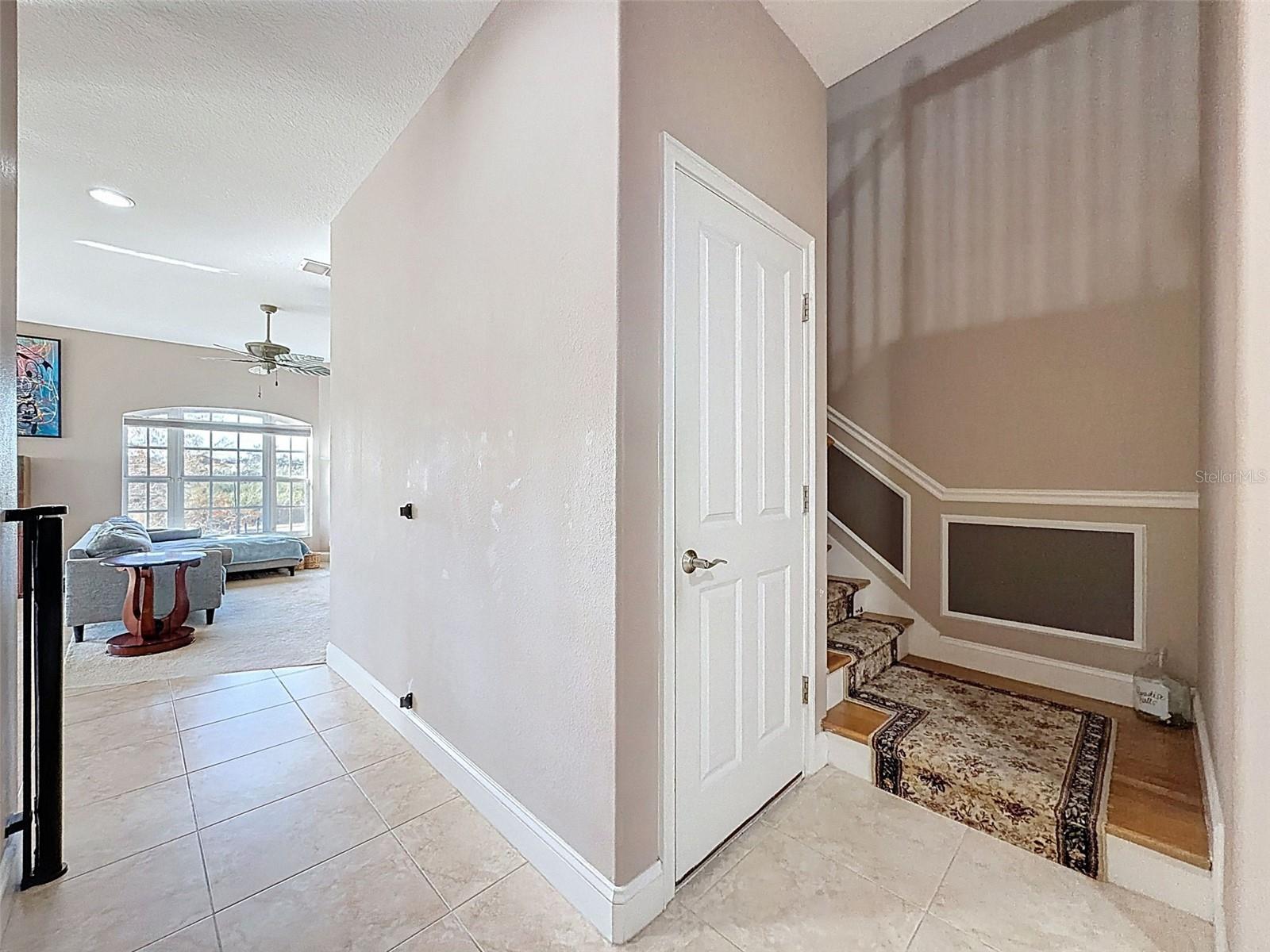 Foyer with stairs to second floor