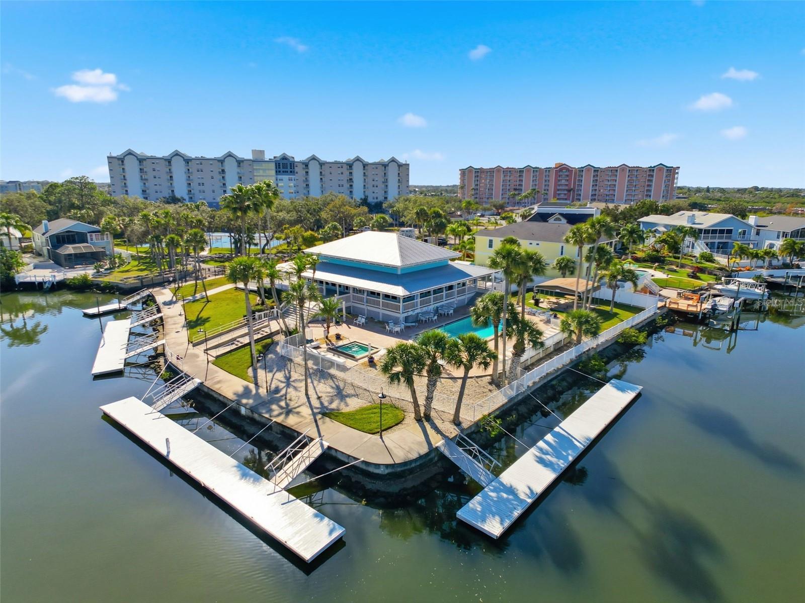 Aerial view of the clubhouse with pool and docs