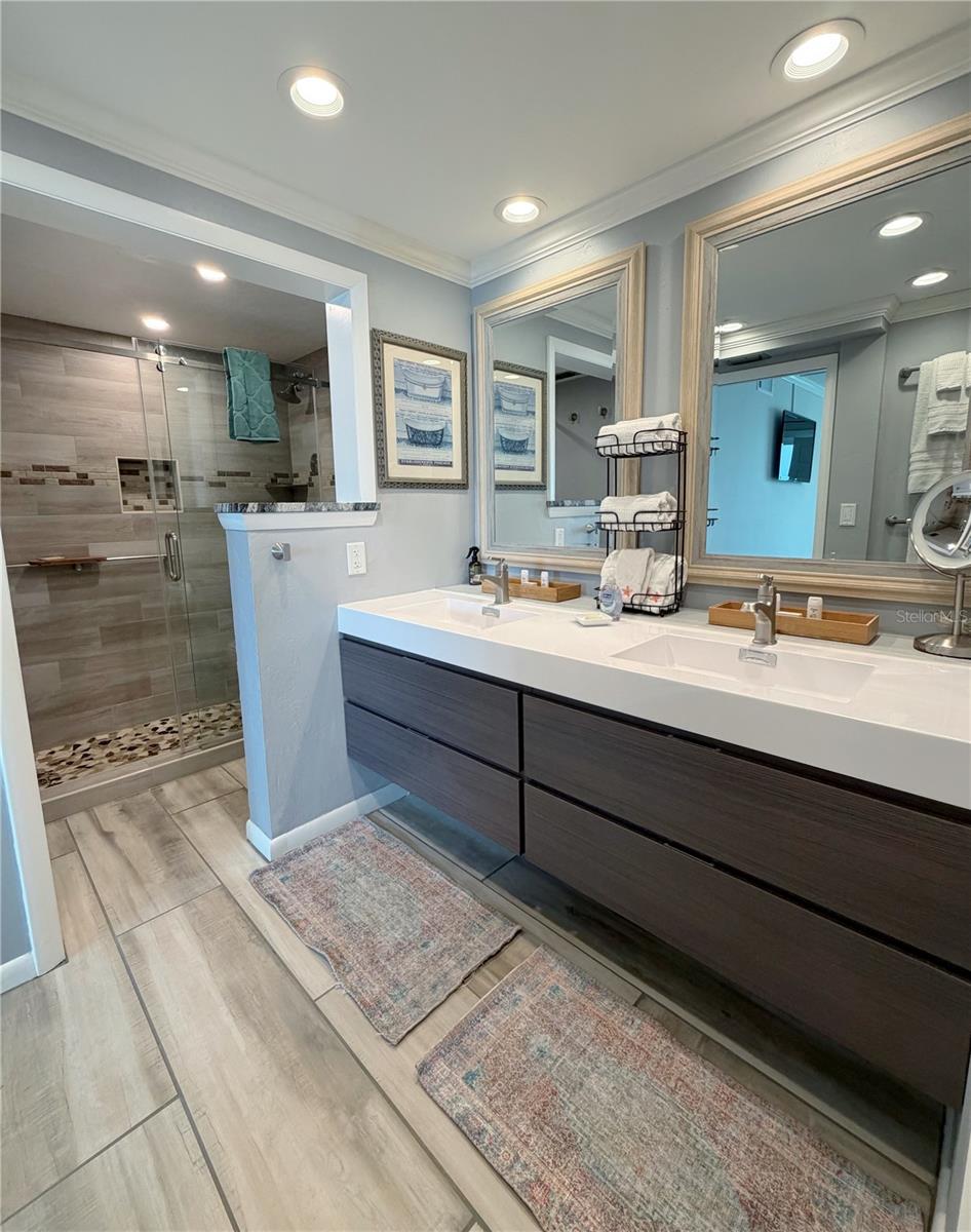 Primary bathroom looking towards the spa like shower.