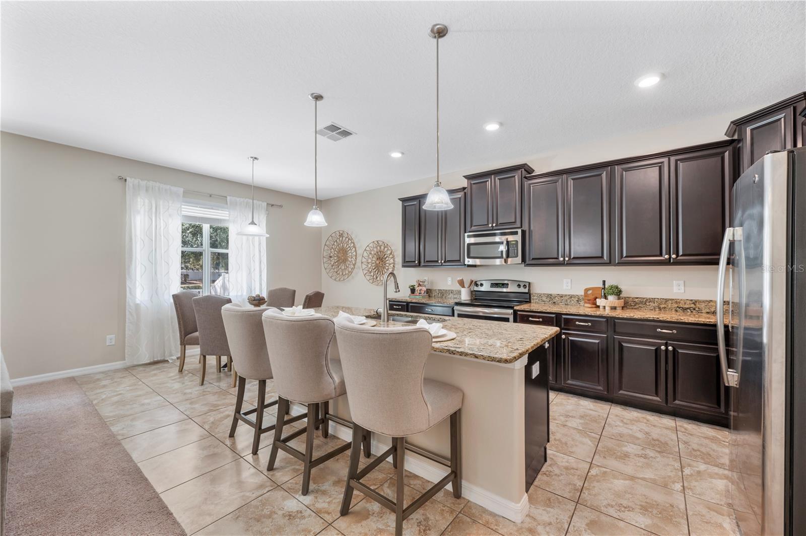 Open kitchen with Stainless Appliances