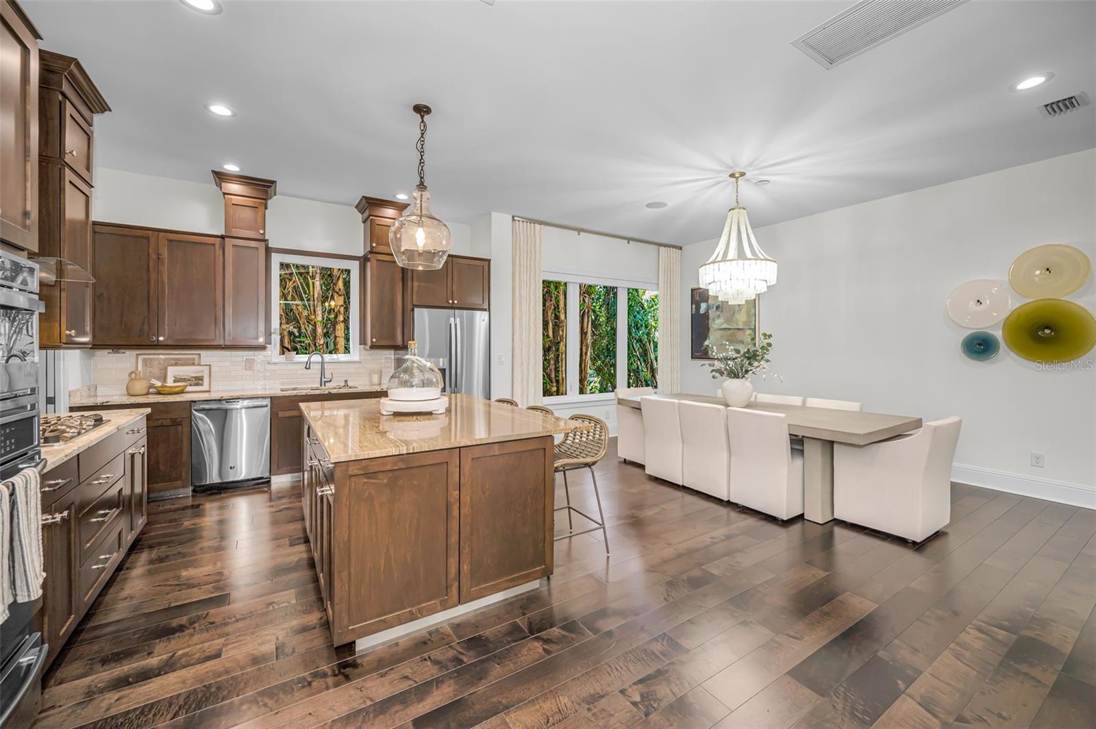 This culinary space seamlessly includes the Dining Area.