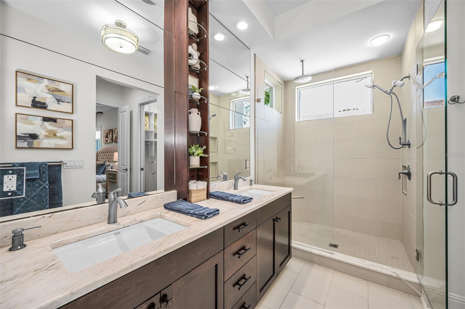 Dual Vanity Bathroom with large shower.