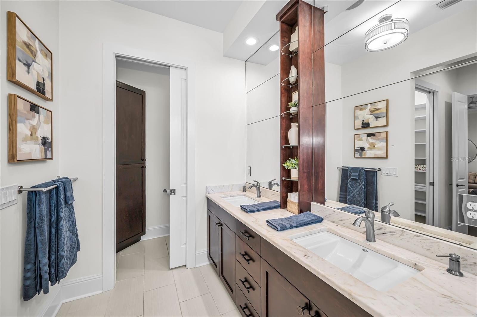 Spa-like feel with dual closets.