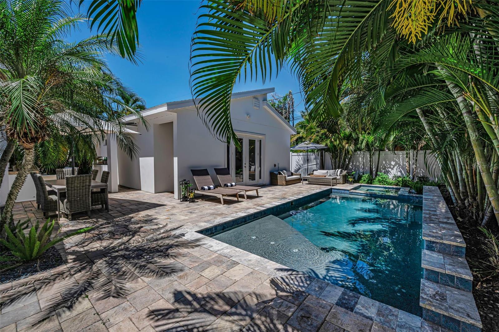 Step outside to your secluded outdoor oasis offering a newer constructed pool (2021)...