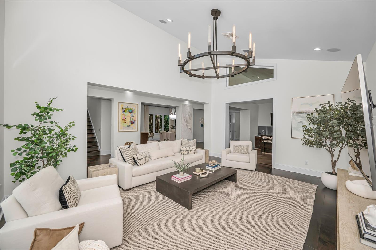 A beautiful flow to the Kitchen and Dining Area just off the Living Room.