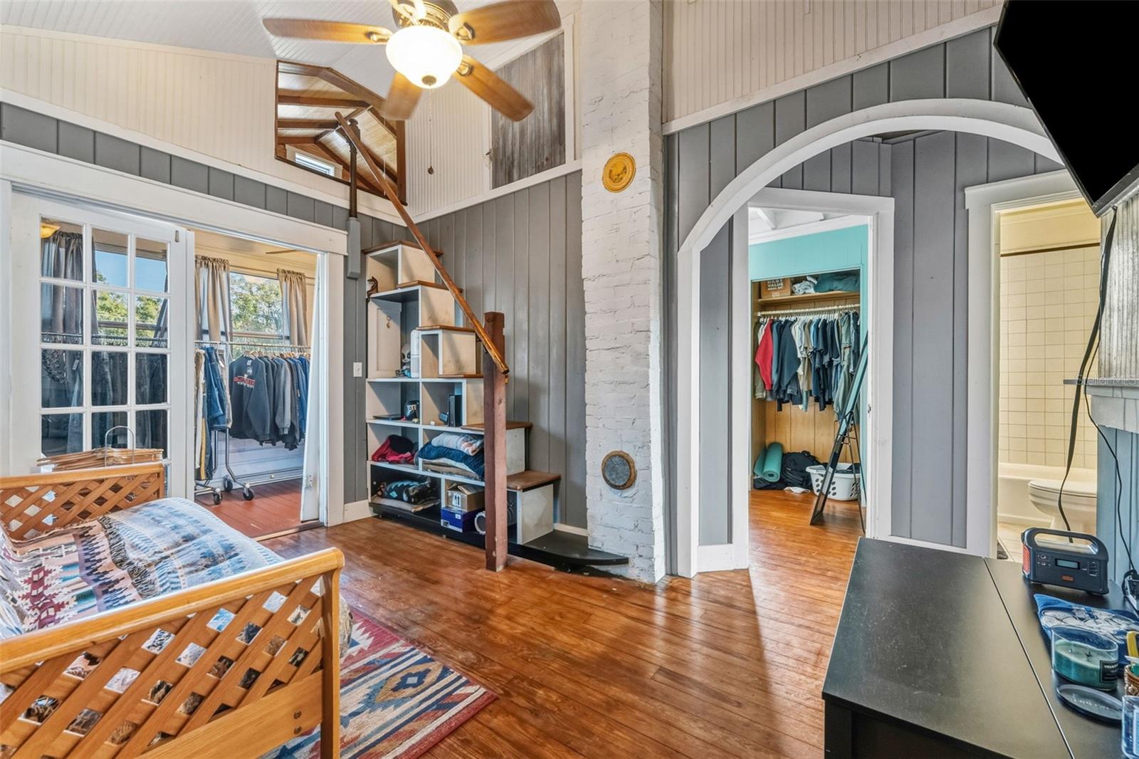 Bookshelf staircase up to loft