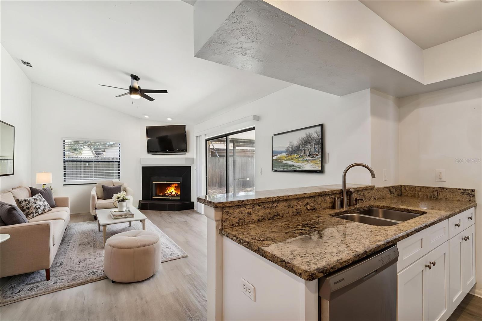 STAGED KITCHEN DEN AREA