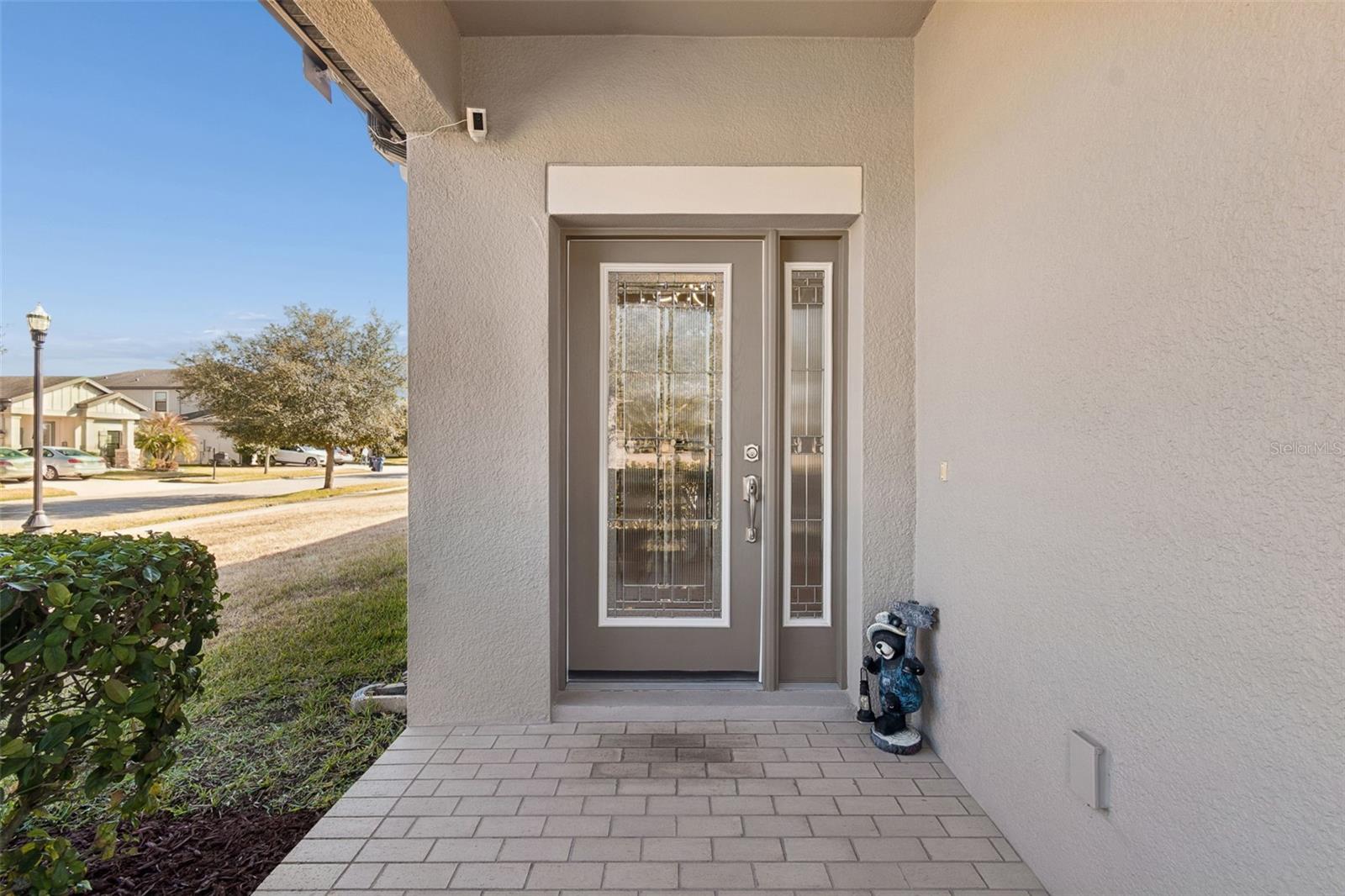 Glass door entry with sidelight