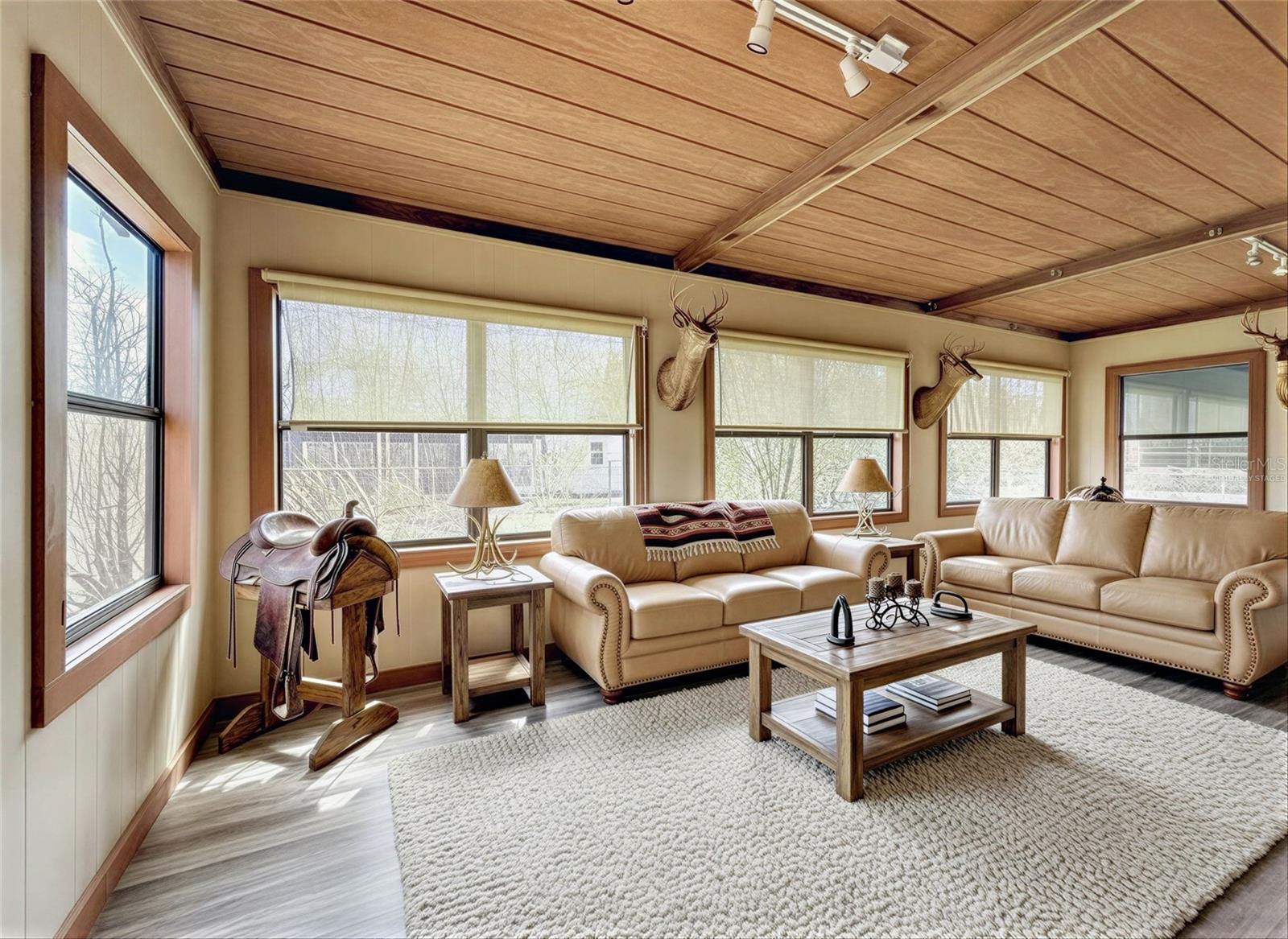 Virtually staged enclosed headed and cooled FL room