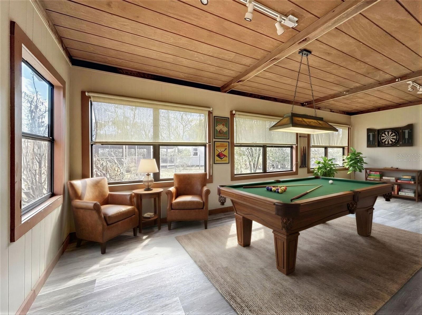 Virtually staged enclosed headed and cooled FL room