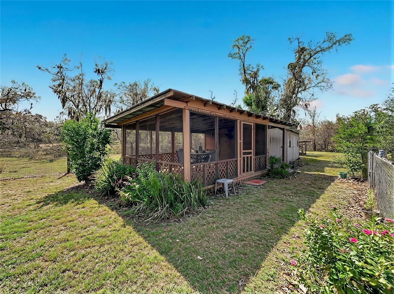 Detached Covered and Screened in Outbuilding multi use. options