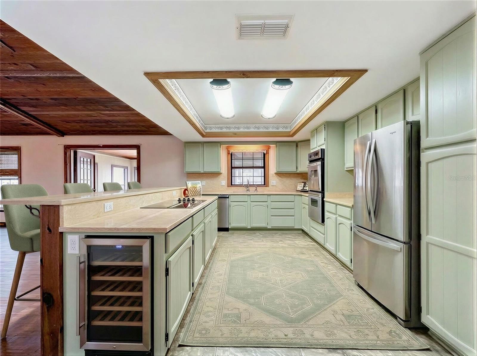 sample of green kitchen potential -virtually colored and staged cabinet removed virtually