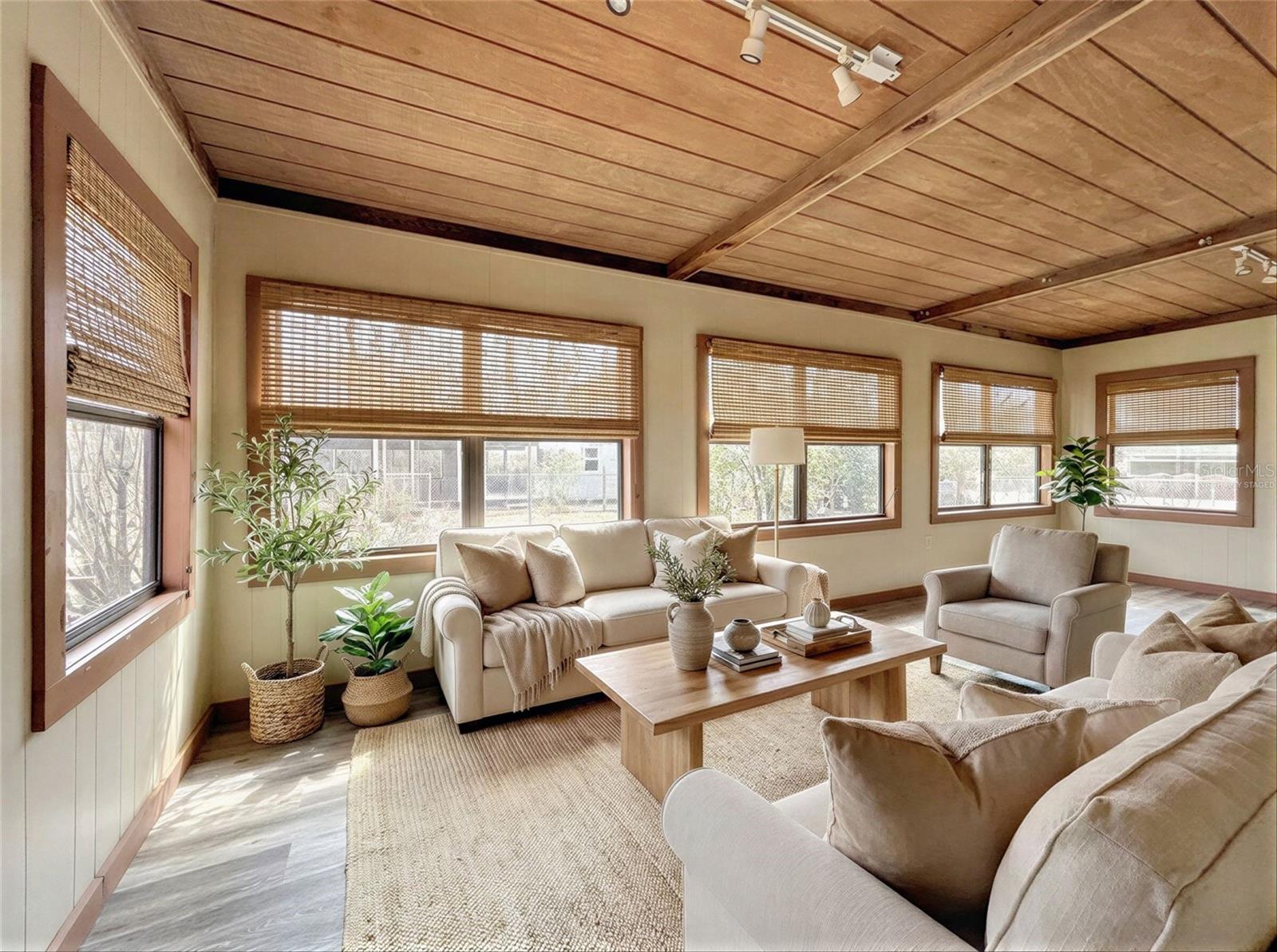 Virtually staged enclosed headed and cooled FL room