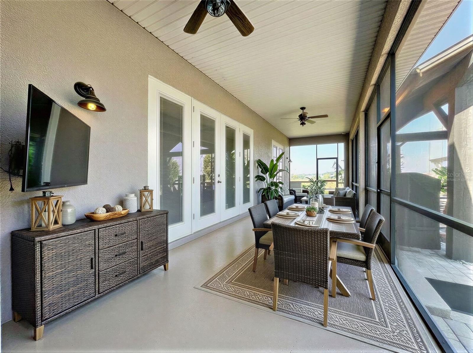 Virtually Staged back screened in covered porch