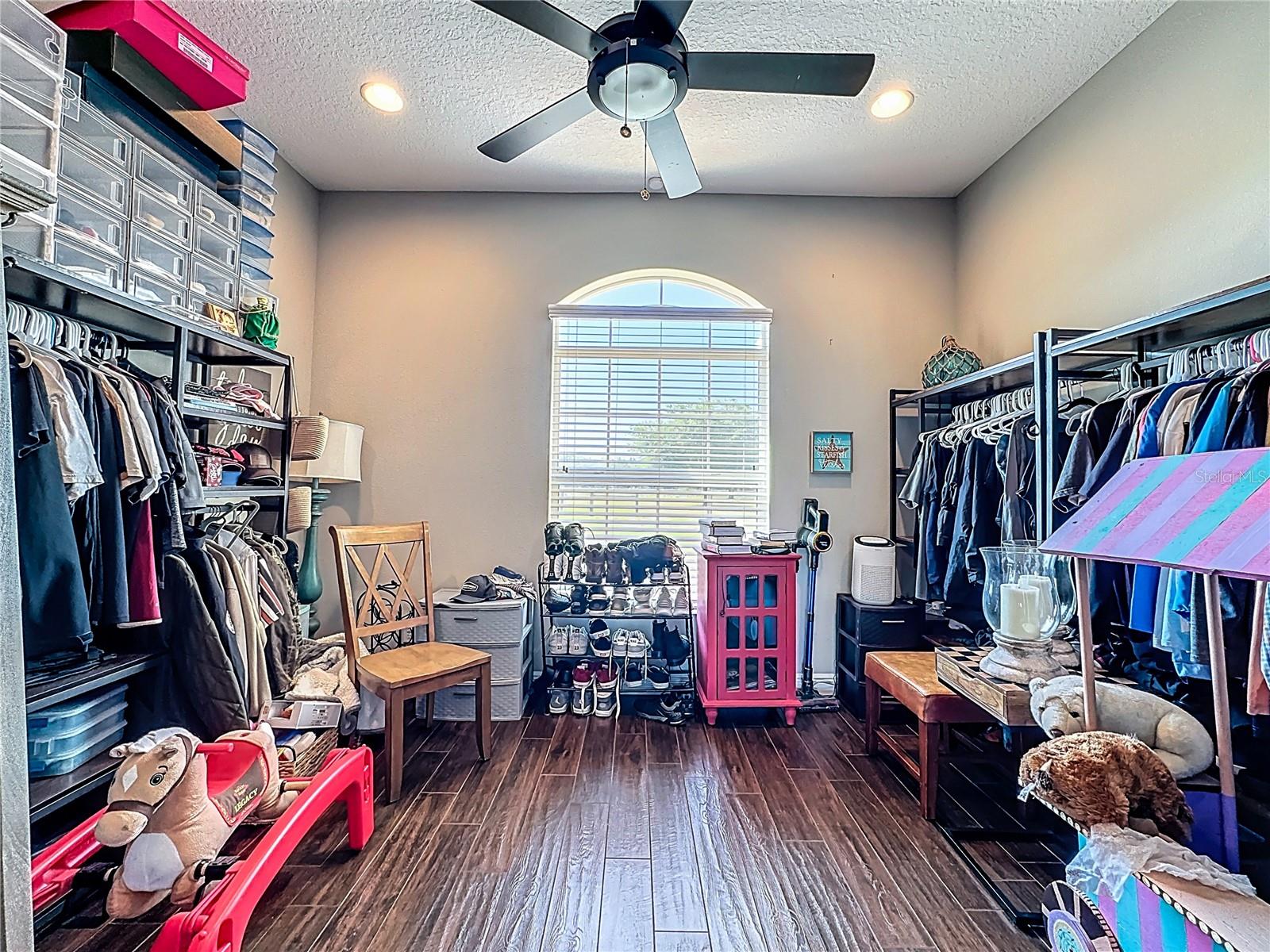 flex room currently being used as the Sex and The City Size Closet. Can be converted back to Office/Den