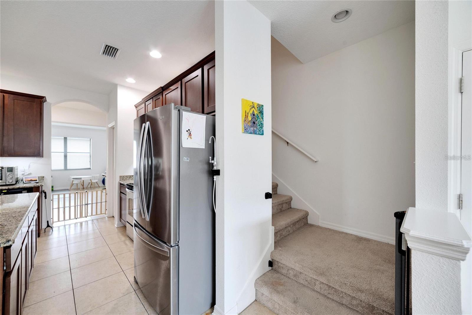 Kitchen Stairway to Bonus Room