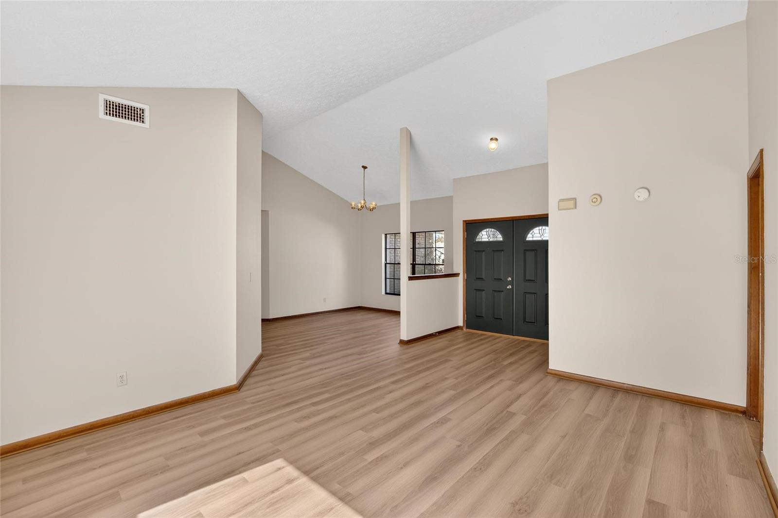 View of Foyer and Dining Area from the Living Room