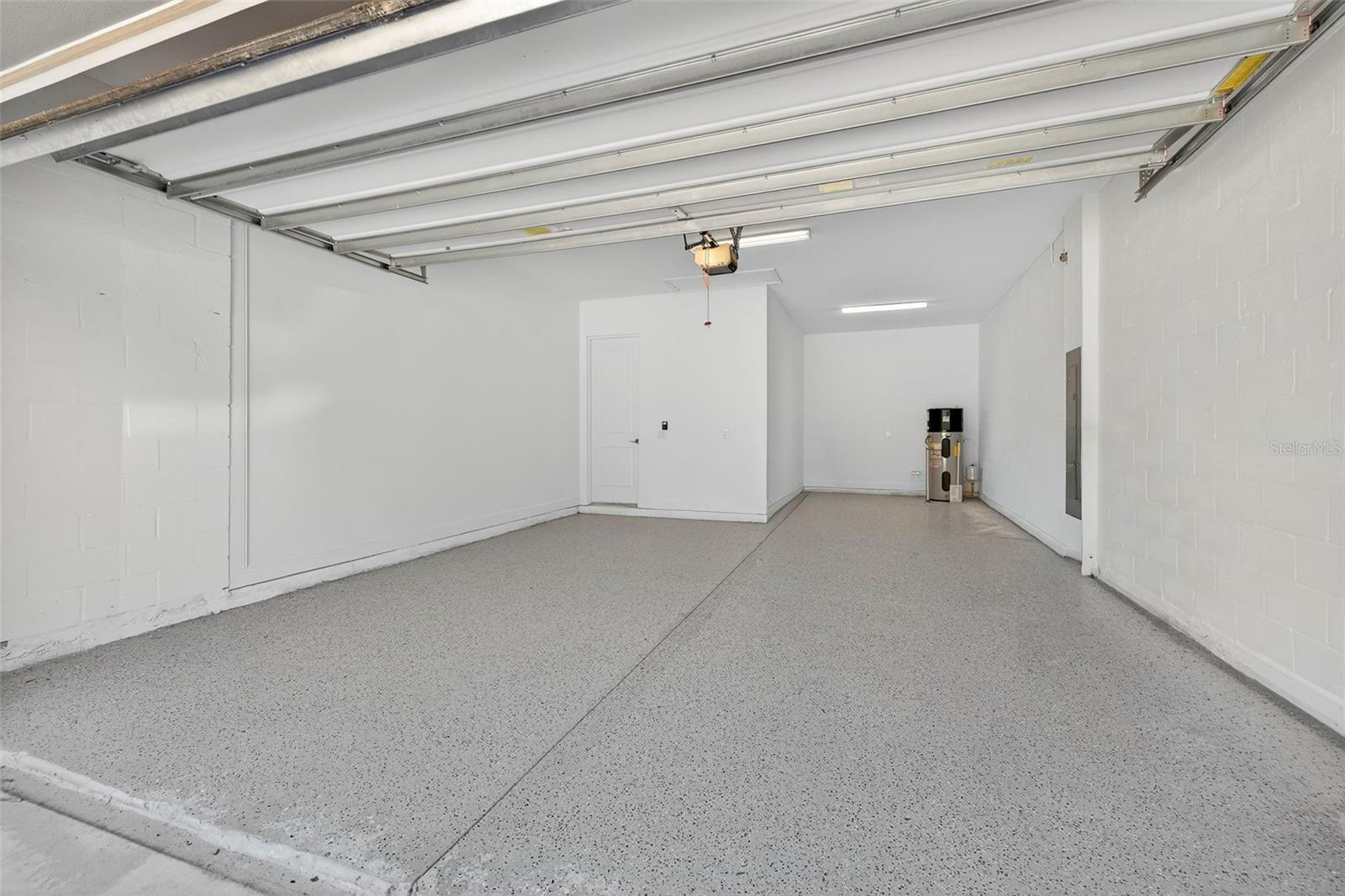 3 car tandem garage with epoxy flooring