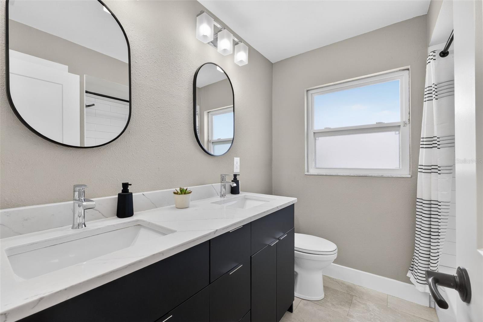 Double sink vanaties and updated bathroom for complete enjoyment