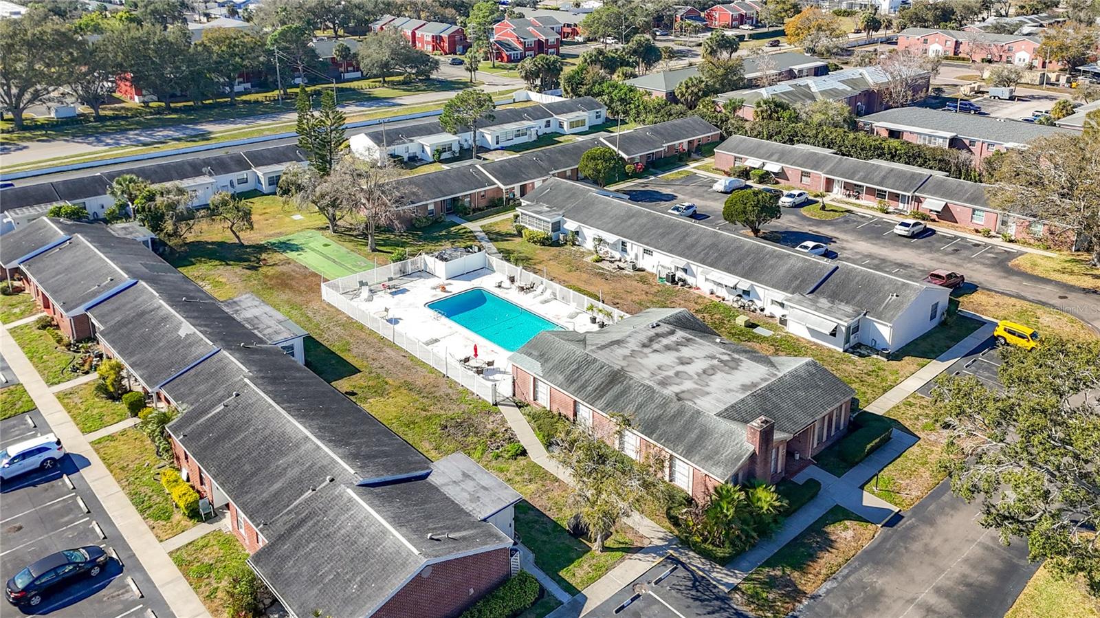 1020 85th Ave N no 119, Concord Village South community pool and clubhouse, view toward southwest