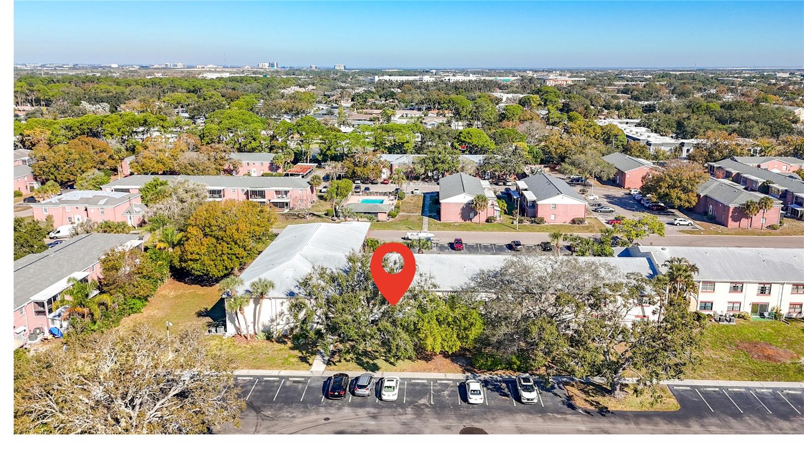 1020 85th Ave N no 119, view toward north, visitor parking at back of unit