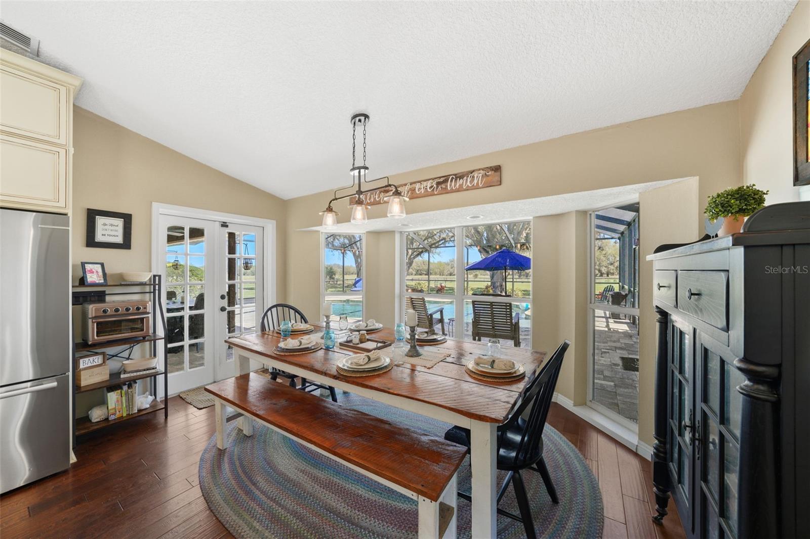 Dining looks out to pool area