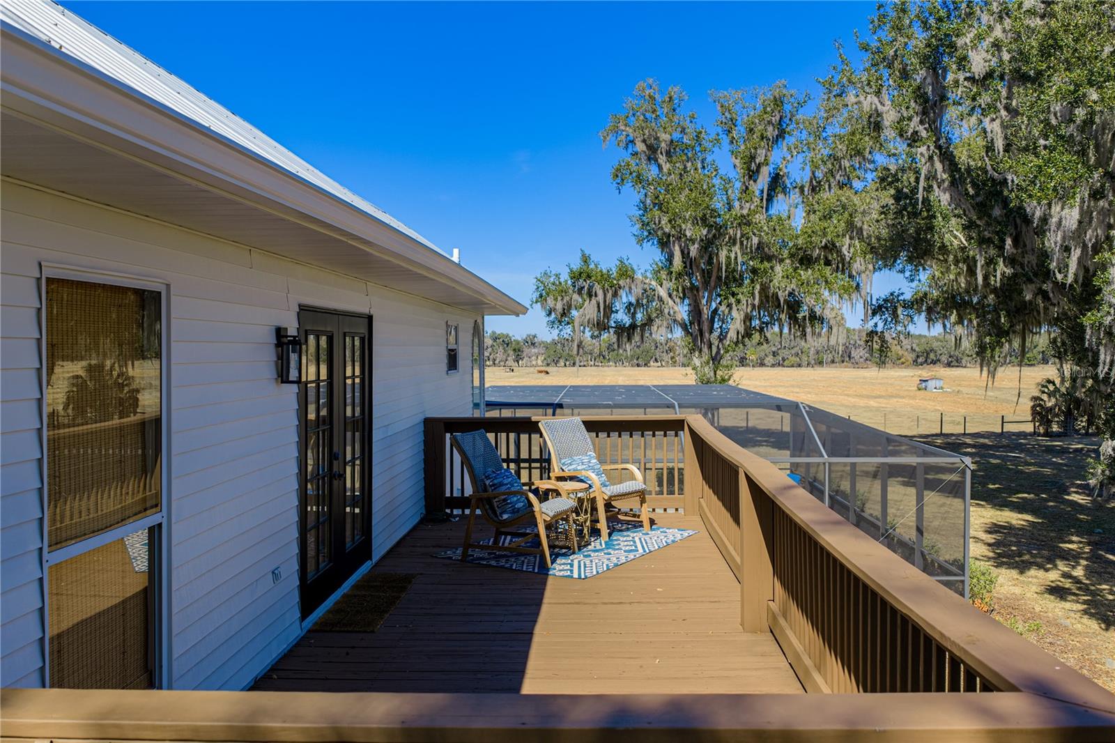 Primary bedroom private balcony with sunrise views