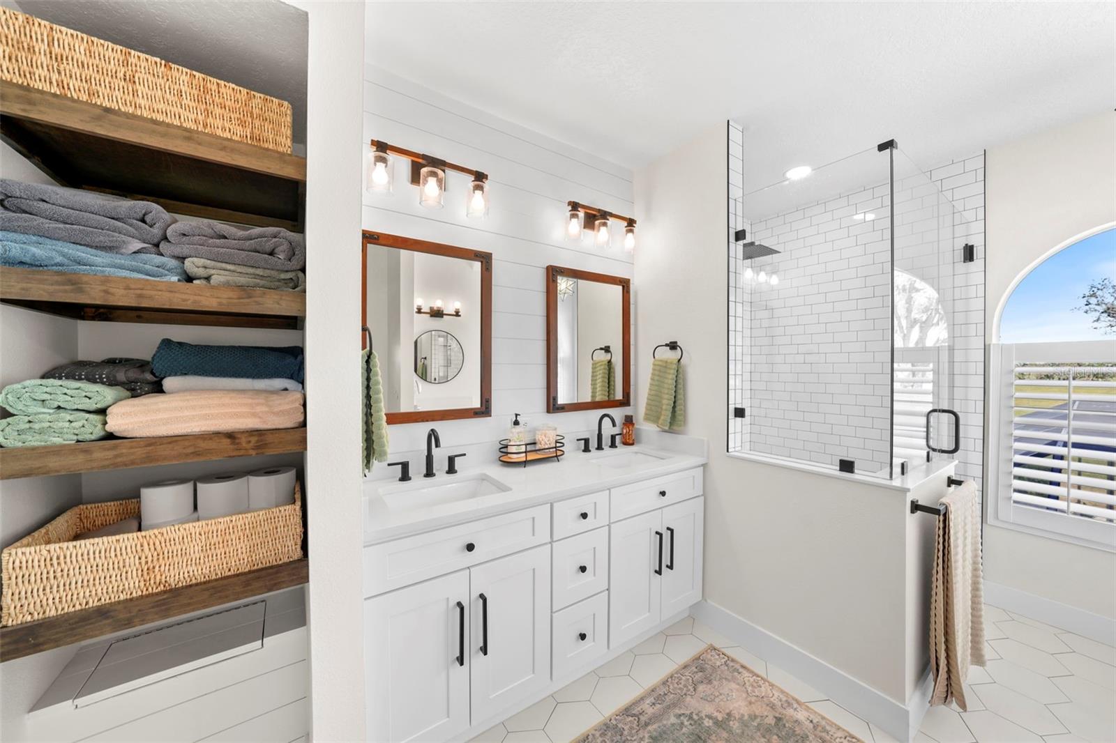 Double vanity with laundry chute