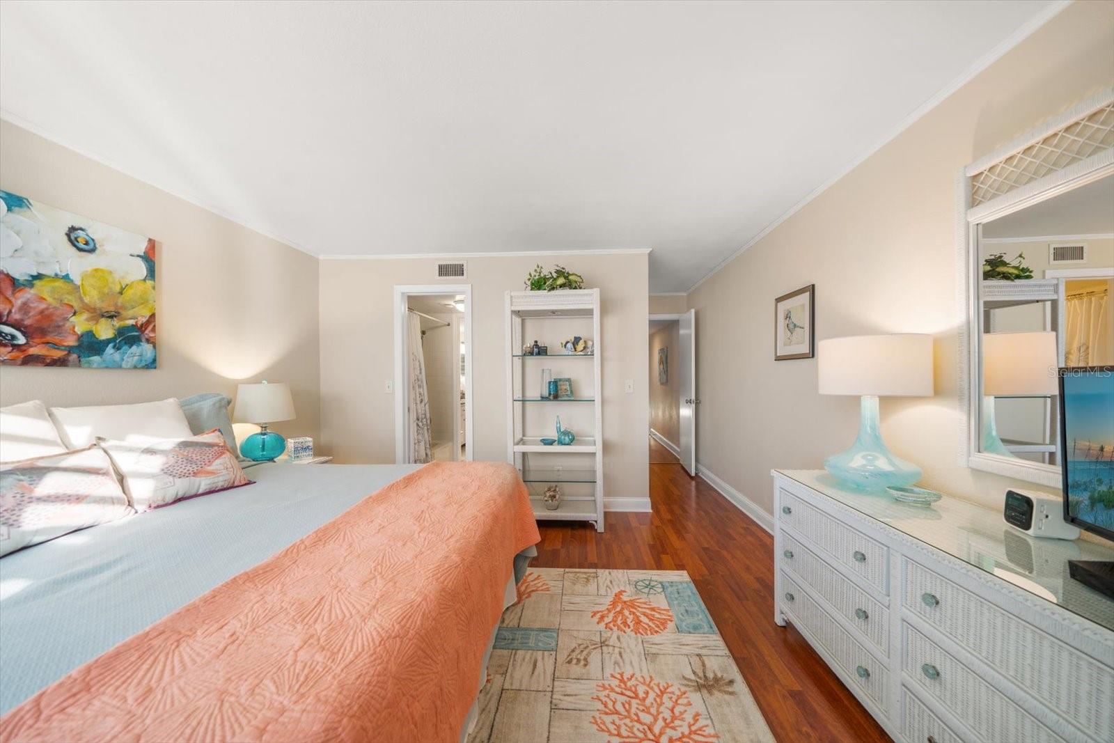 Lovely flooring, the primary suite shows light and bright.