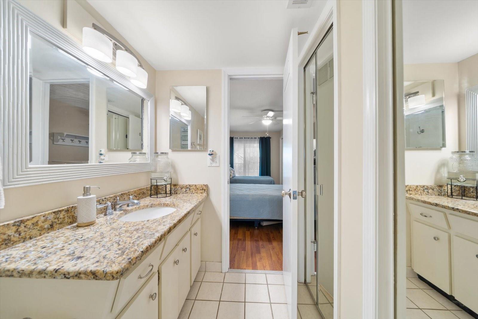 Primary bath area has lots of storage.