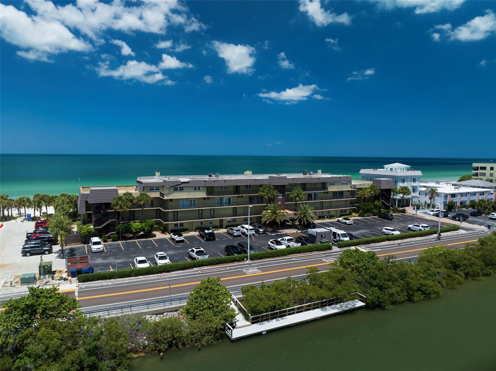 Enjoy this outstanding location with the intracoastal on the bay side and the Gulf and beaches at your back door!!