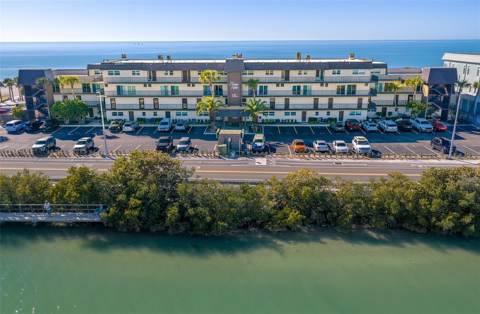 The Fiddler on the beach; 34 units on 300 feet of beaches and Gulf-a very rare find!