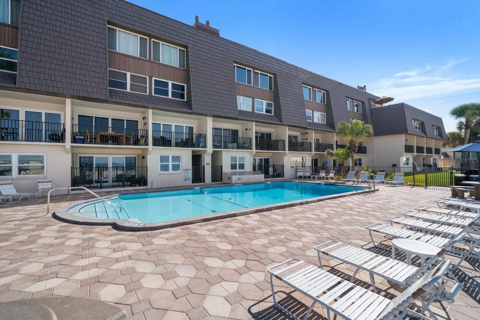 Heated pool on beach side-lots of sundecking!