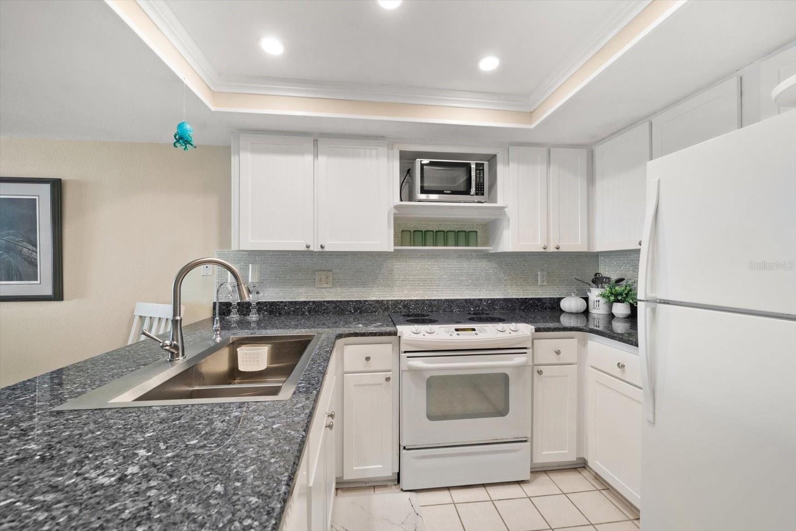 Cook up some fun in this lovely fully equipped kitchen!!